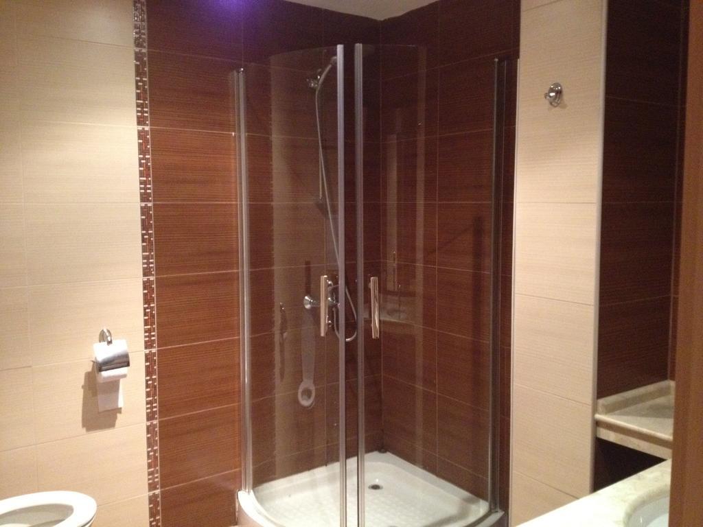 Tm Deluxe Hotel Pantai Sunny Ruang foto